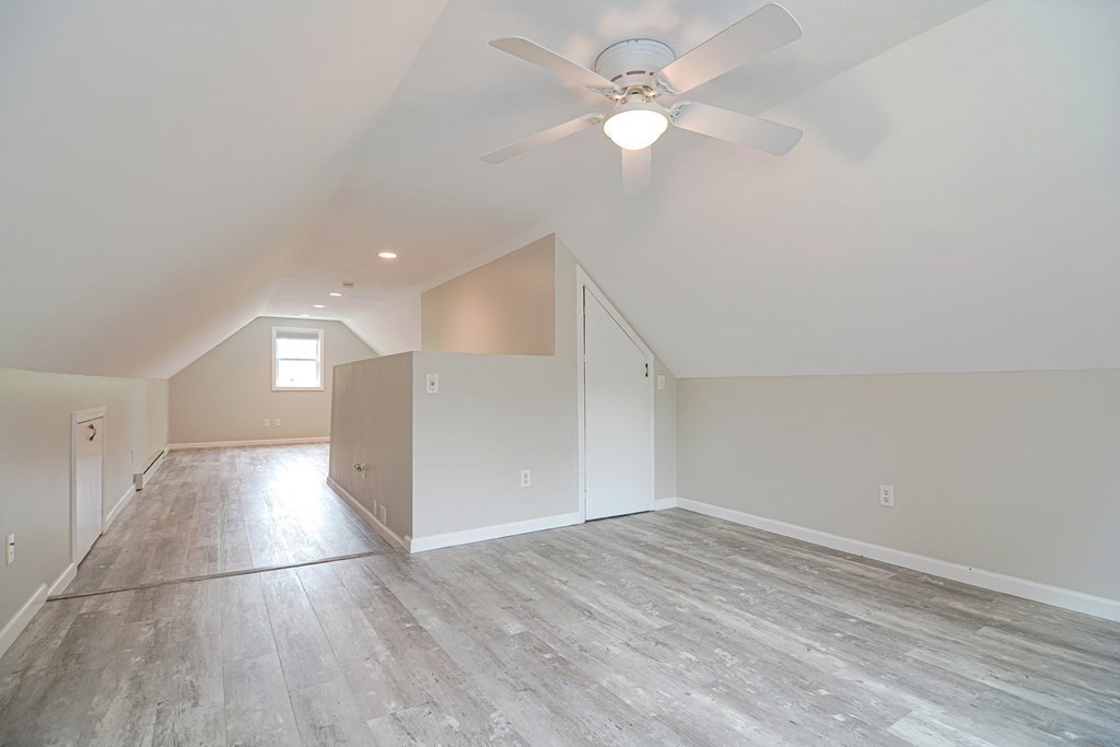 93 Cameron Road Norwood, MA 02062 - Photo 32 of 42 wooden floor in an empty room with a window