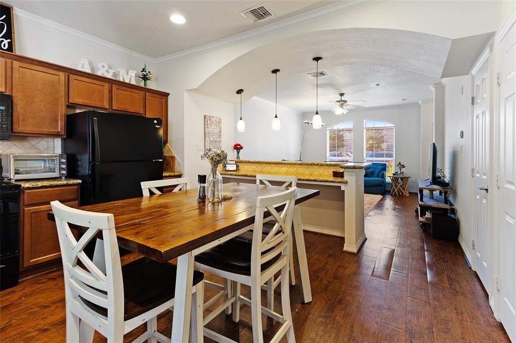 1198 Jones-Butler Road, Unit MULTI College Station, TX 77840 - Photo 22 of 36 a dining table with chairs and kitchen view