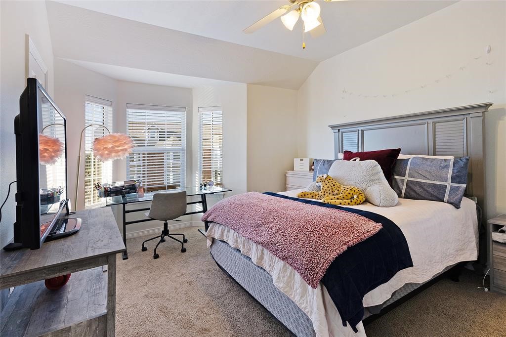 1198 Jones-Butler Road, Unit MULTI College Station, TX 77840 - Photo 27 of 36 a bedroom with bed and large windows