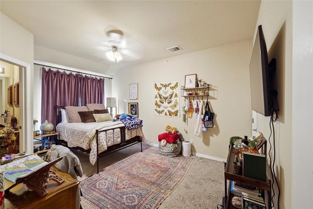 1198 Jones-Butler Road, Unit MULTI College Station, TX 77840 - Photo 10 of 36 a bedroom with furniture and a flat screen tv