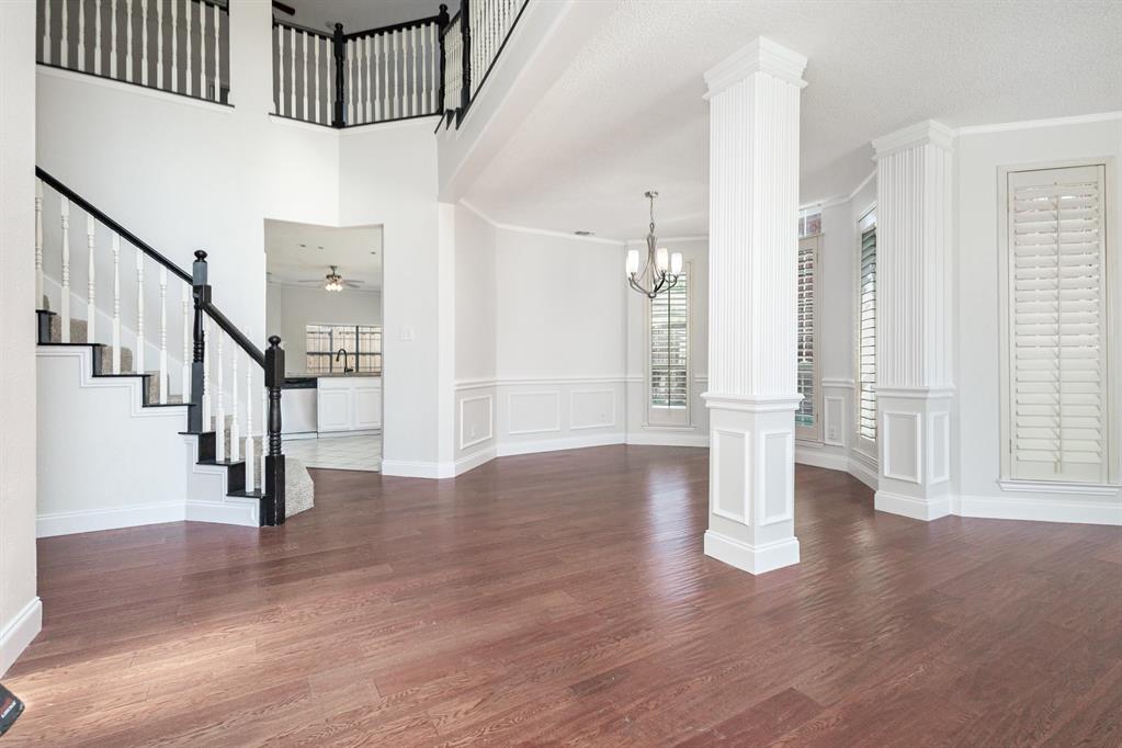 906 Beau Drive Coppell, TX 75019 - Photo 15 of 35 a view of entryway with wooden floor and stairs