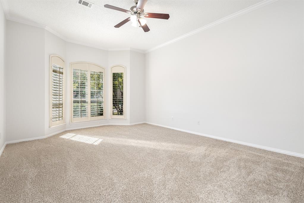 906 Beau Drive Coppell, TX 75019 - Photo 19 of 35 a view of an empty room with a window