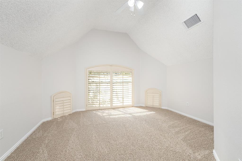 906 Beau Drive Coppell, TX 75019 - Photo 21 of 35 a view of an empty room with a window