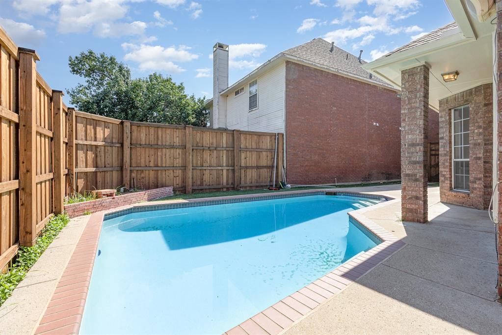 906 Beau Drive Coppell, TX 75019 - Photo 34 of 35 a view of a backyard