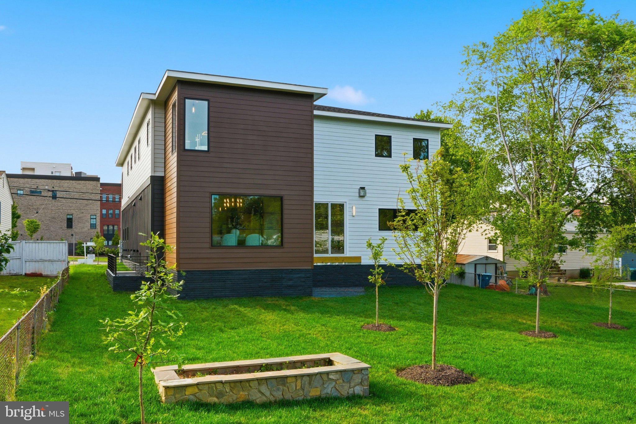 7421 Magarity Road Falls Church, VA 22043 - Photo 66 of 66 Modern home with lush green yard.
