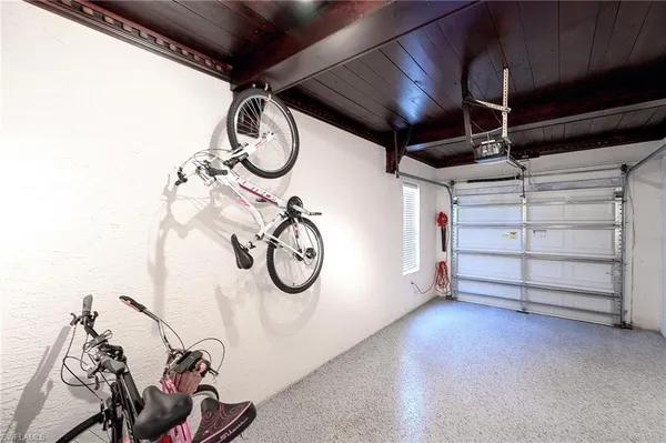 a view of a room with rack and white walls