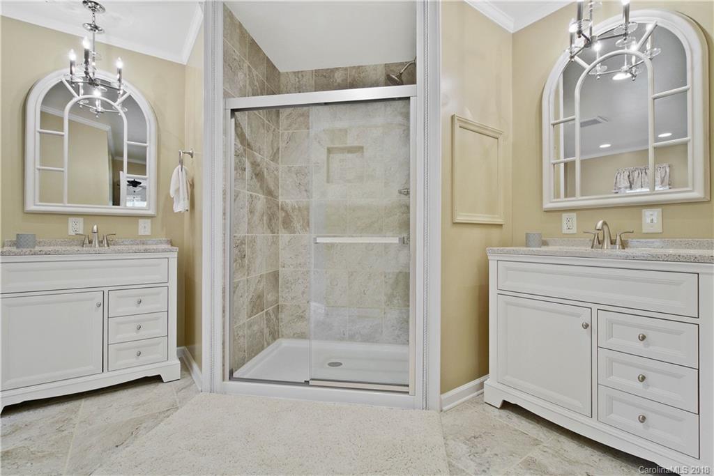1948 Kadena Lane York, SC 29745 - Photo 14 of 25 a bathroom with a shower sink and mirror