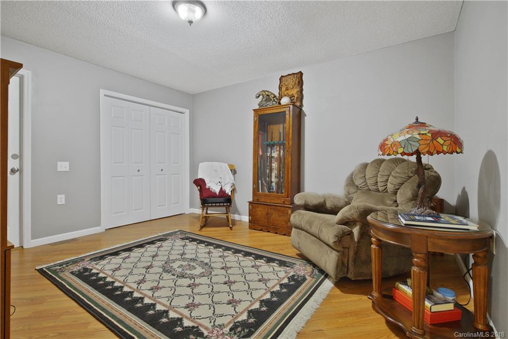 1948 Kadena Lane York, SC 29745 - Photo 19 of 25 a living room with furniture and a rug