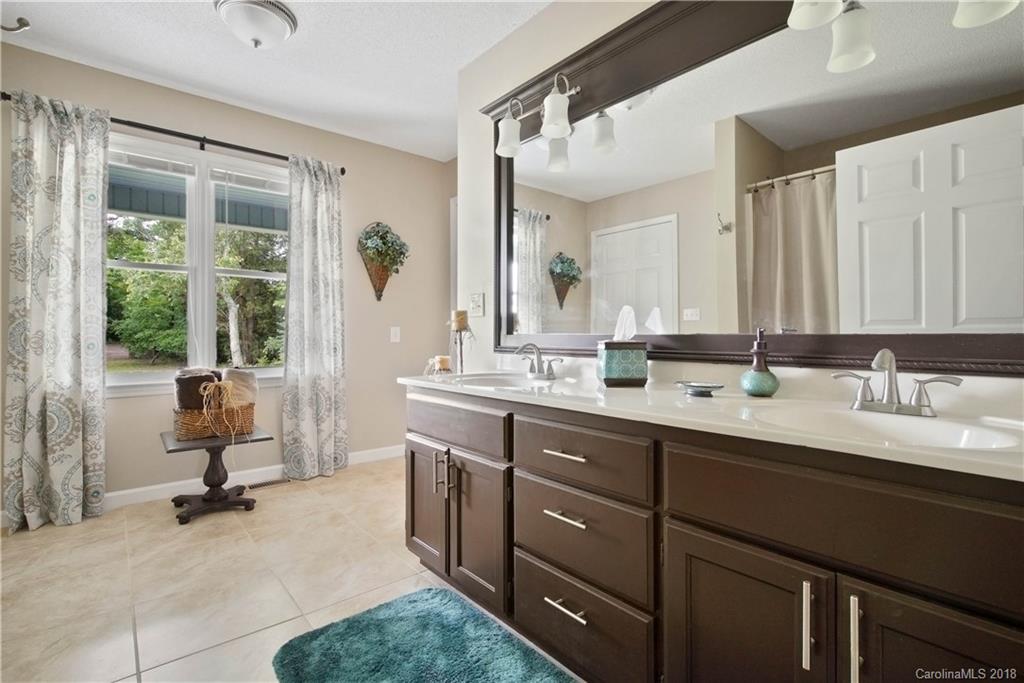 1948 Kadena Lane York, SC 29745 - Photo 20 of 25 a bathroom with a sink double vanity and a mirror