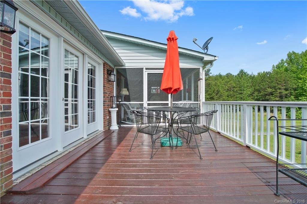 1948 Kadena Lane York, SC 29745 - Photo 23 of 25 a balcony with chairs and wooden floor