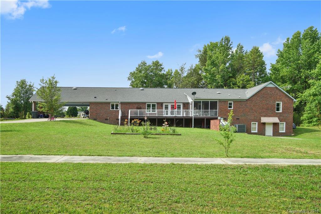 1948 Kadena Lane York, SC 29745 - Photo 24 of 25 a front view of a house with a yard and trees