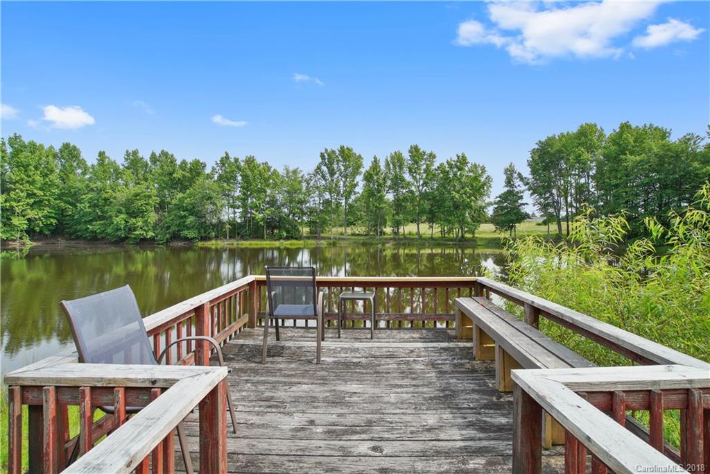 1948 Kadena Lane York, SC 29745 - Photo 25 of 25 a view of a balcony with lake view and wooden floor