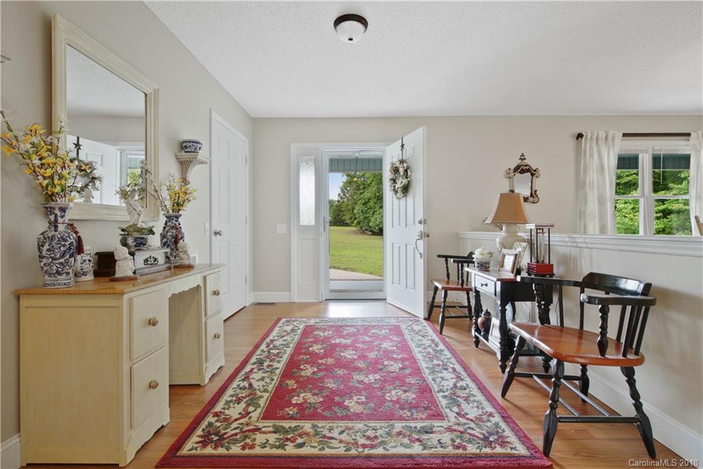 1948 Kadena Lane York, SC 29745 - Photo 4 of 25 a view of a dining room with furniture window and wooden floor