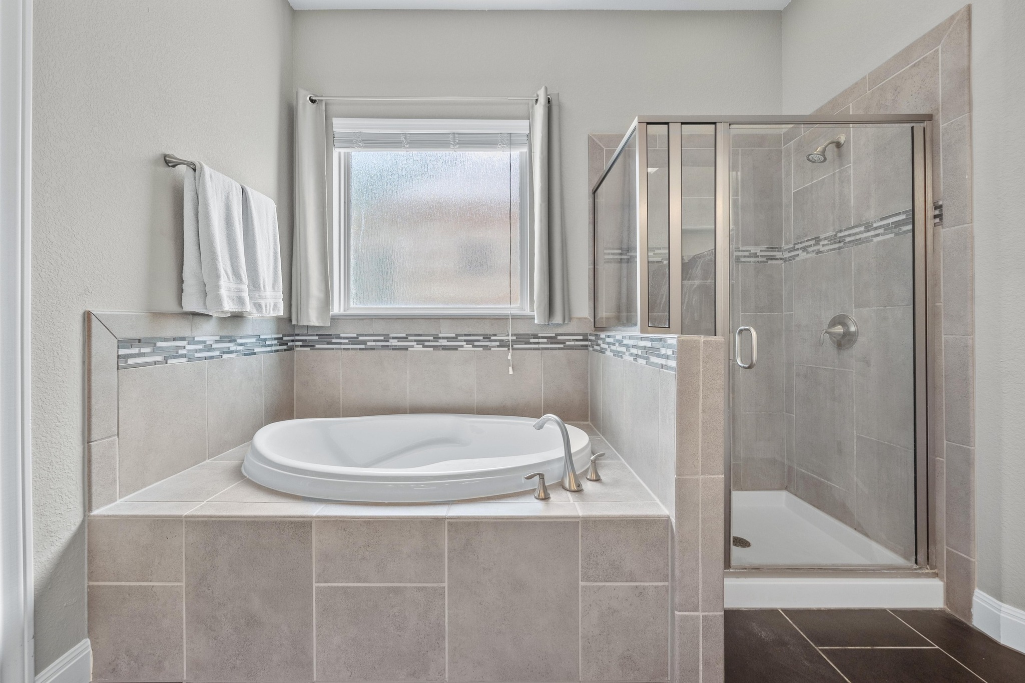 2114 Manada Trail Leander, TX 78641 - Photo 21 of 36 a bathroom with a toilet a sink and shower