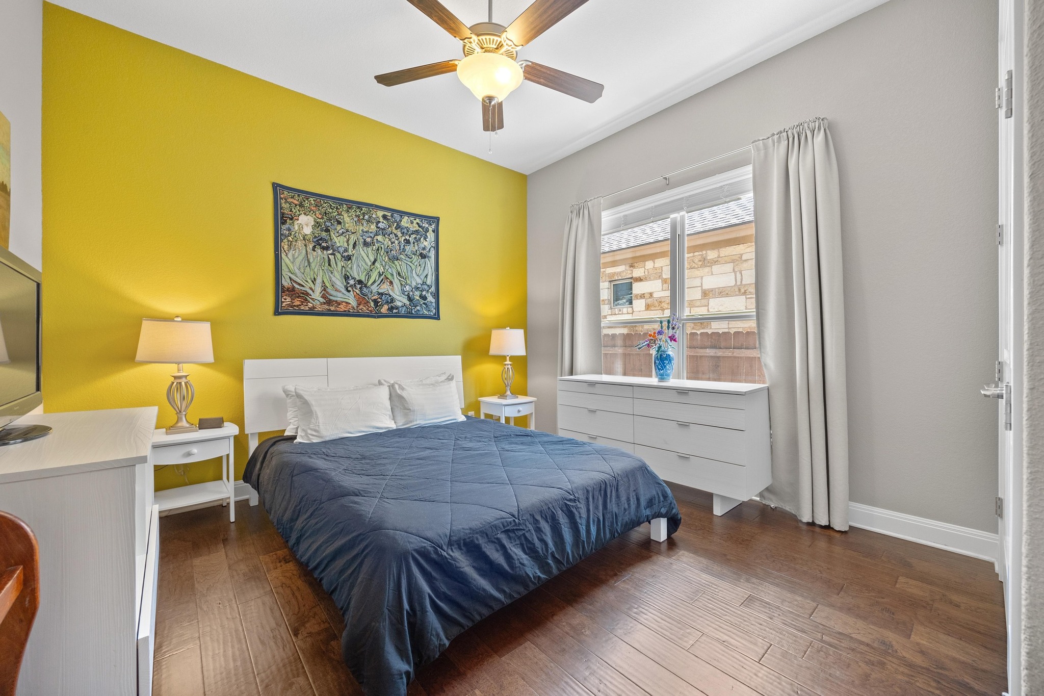 2114 Manada Trail Leander, TX 78641 - Photo 25 of 36 a bedroom with a bed and a window