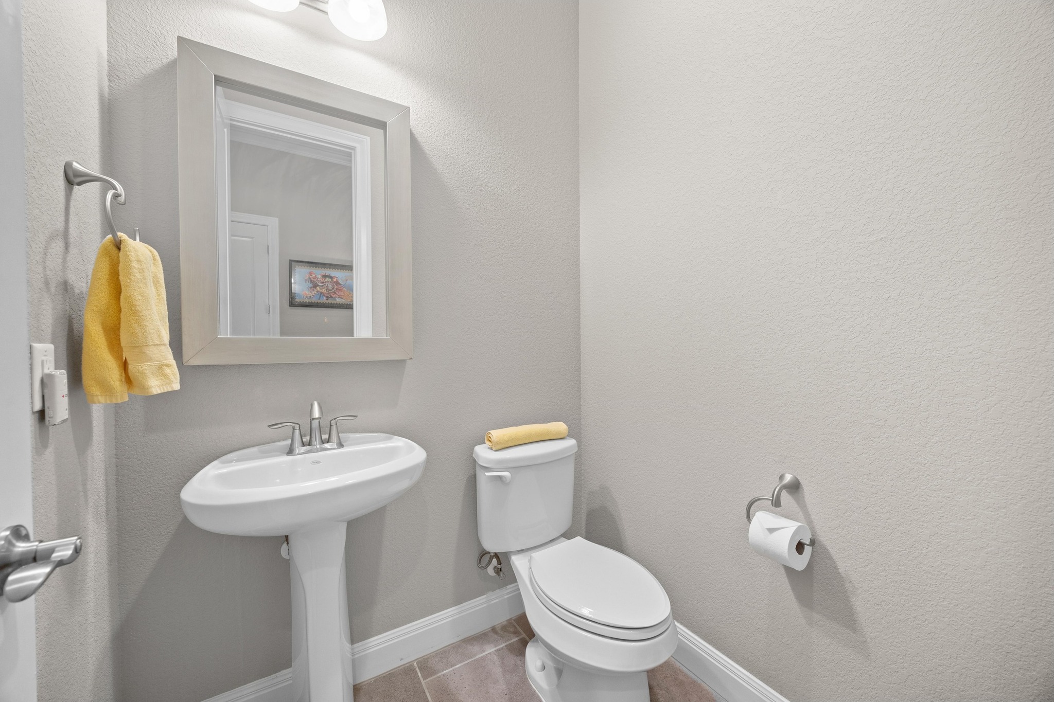 2114 Manada Trail Leander, TX 78641 - Photo 26 of 36 a bathroom with a toilet sink and mirror