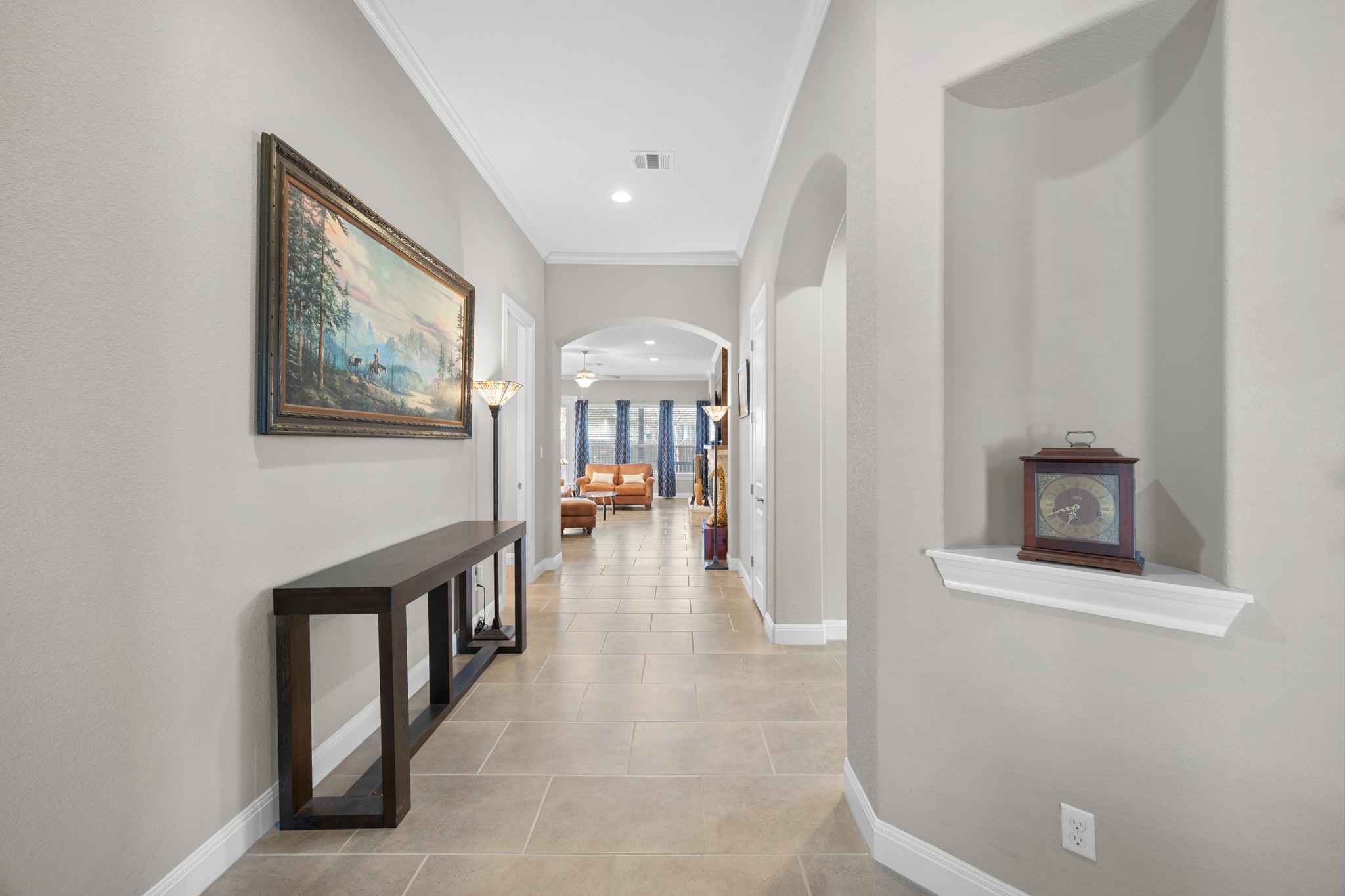 2114 Manada Trail Cedar Park, TX 78641 - Photo 32 of 36 a view of a hallway with entryway wooden floor and windows
