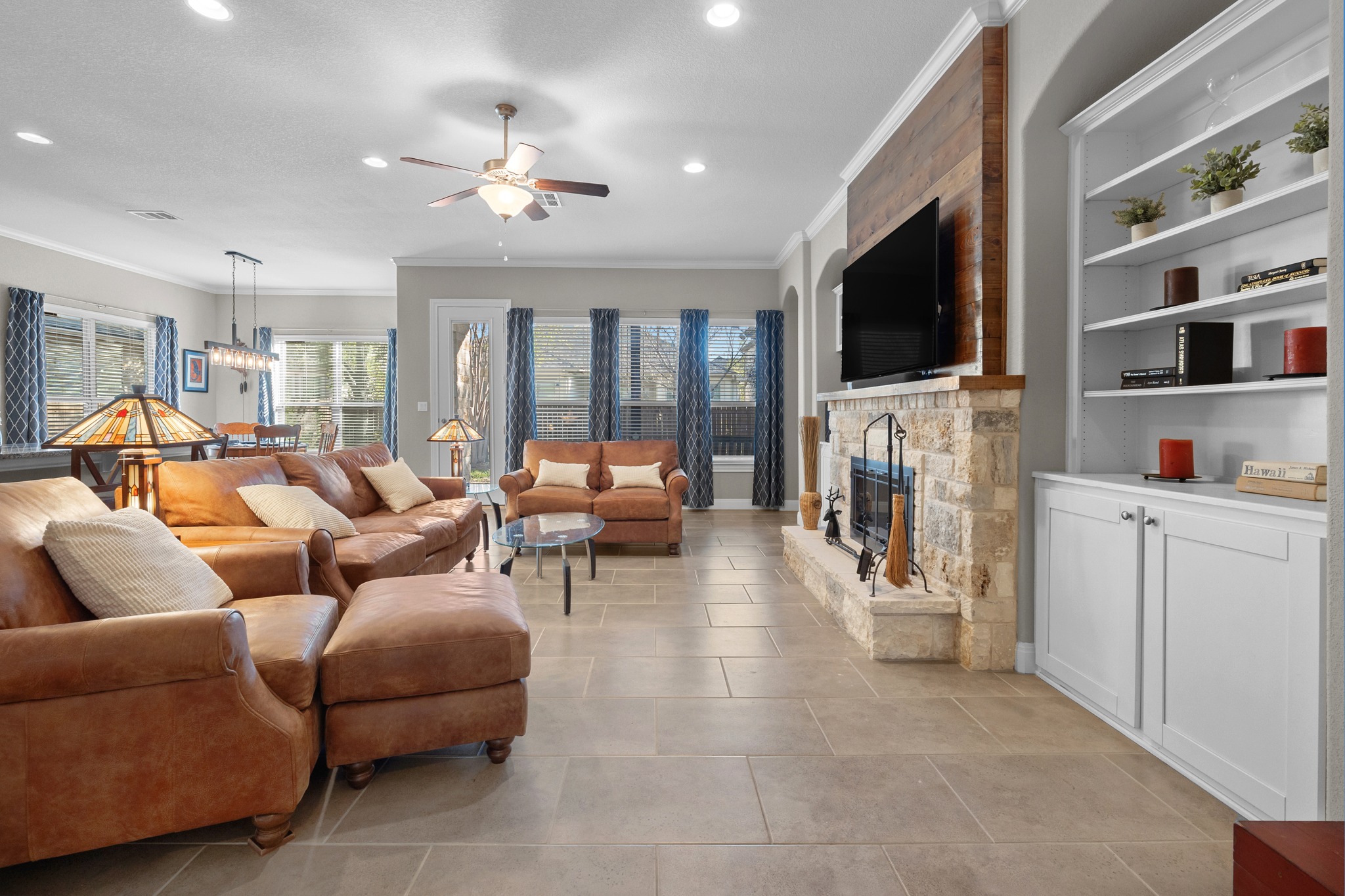 2114 Manada Trail Cedar Park, TX 78641 - Photo 33 of 36 a living room with furniture and a flat screen tv