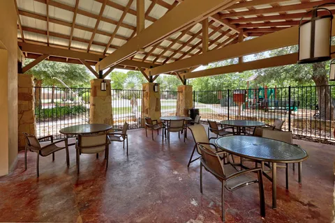 a view of a outdoor space with a patio and sitting area