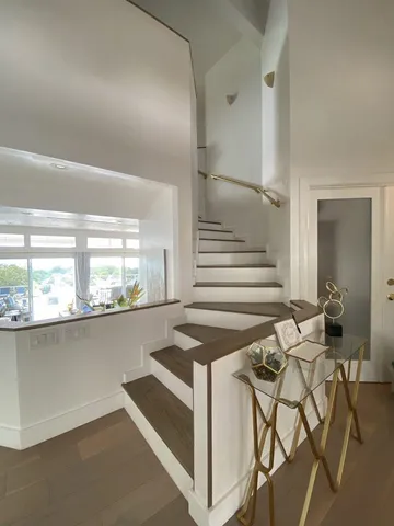 a view of a livingroom with furniture and window