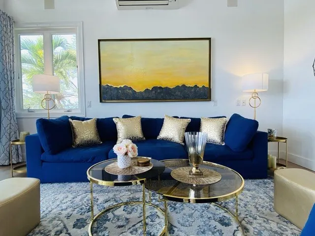 a living room with furniture and a table