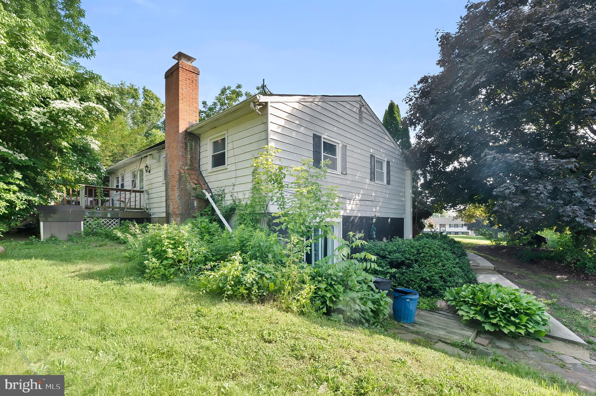 1715 Walker Road Freeland, MD 21053 - Photo 12 of 31 a front view of a house with garden