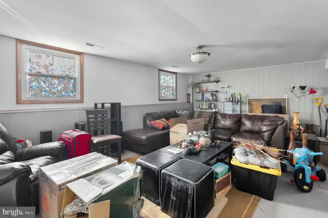 a living room with furniture and a couch
