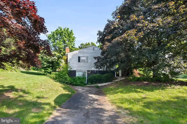 a view of a backyard with a garden