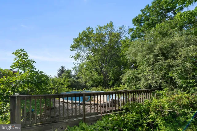 a view of a wooden fence
