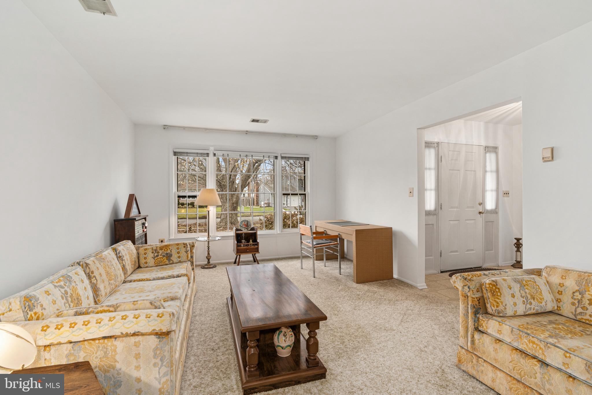 4 David Drive Ewing, NJ 08638 - Photo 5 of 32 a living room with furniture and a large window
