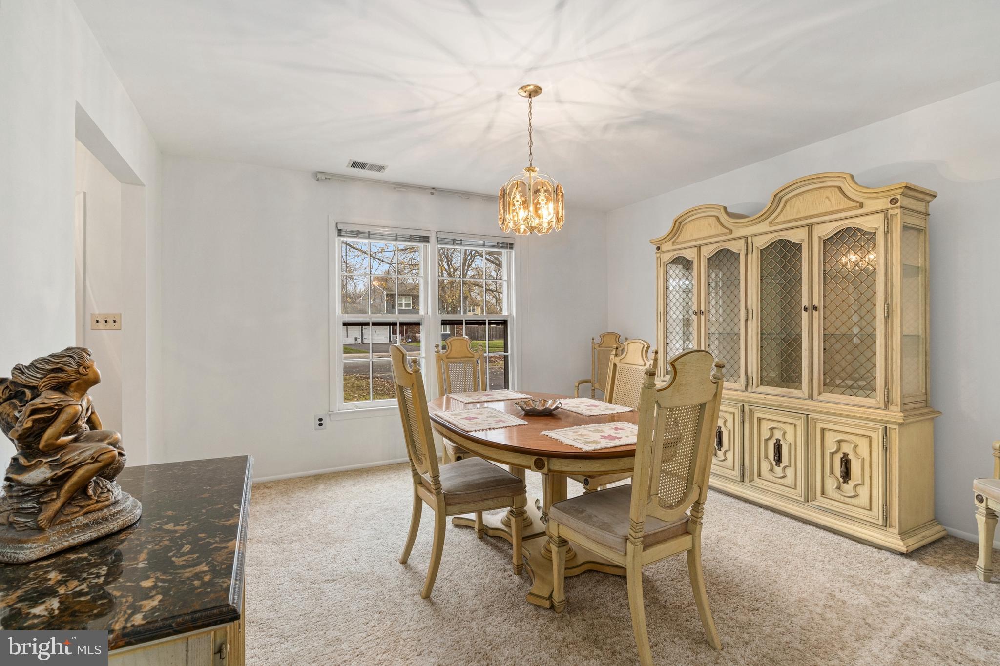 4 David Drive Ewing, NJ 08638 - Photo 8 of 32 a view of a dining room with furniture and wooden floor