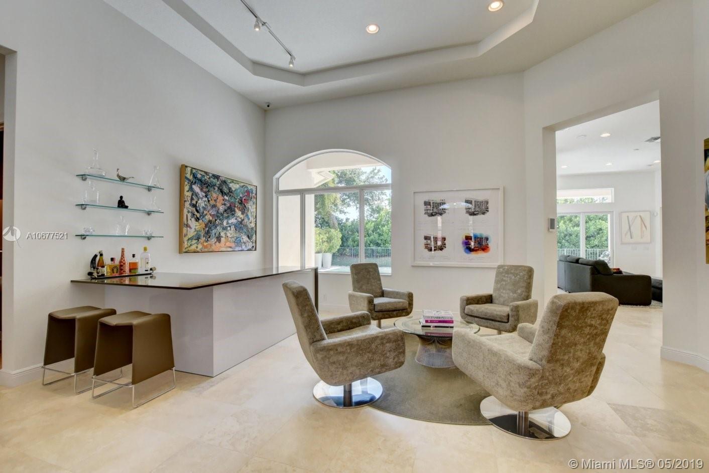17326 Pavaroso Street Boca Raton, FL 33496 - Photo 3 of 30 LIVING ROOM WITH BUILT-IN BAR