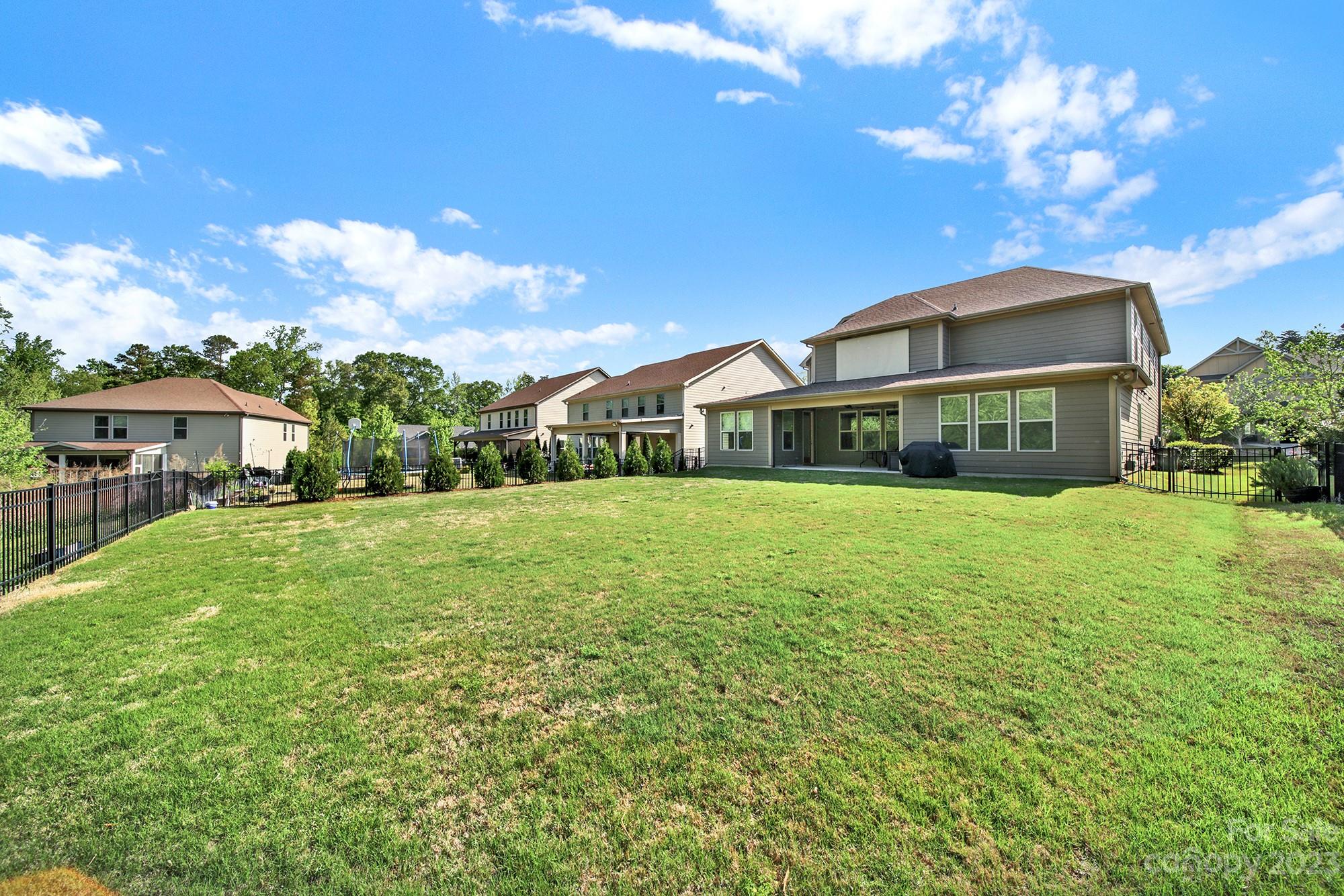 1516 Hazel Street Tega Cay, SC 29708 - Photo 11 of 48 a front view of a house with a yard