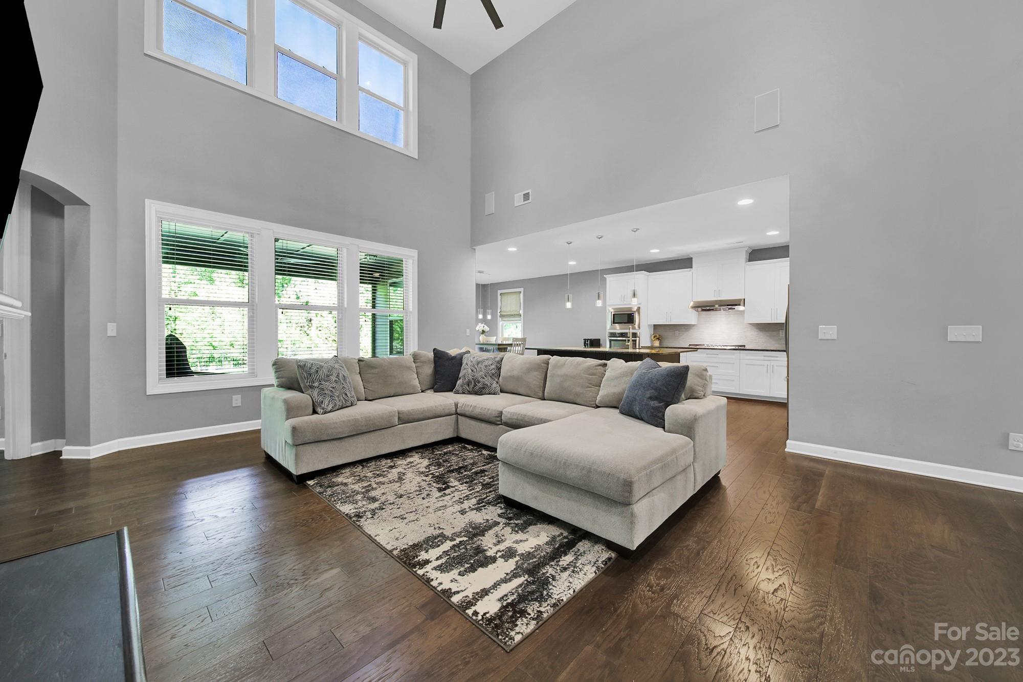 1516 Hazel Street Tega Cay, SC 29708 - Photo 22 of 48 a living room with furniture and a large window