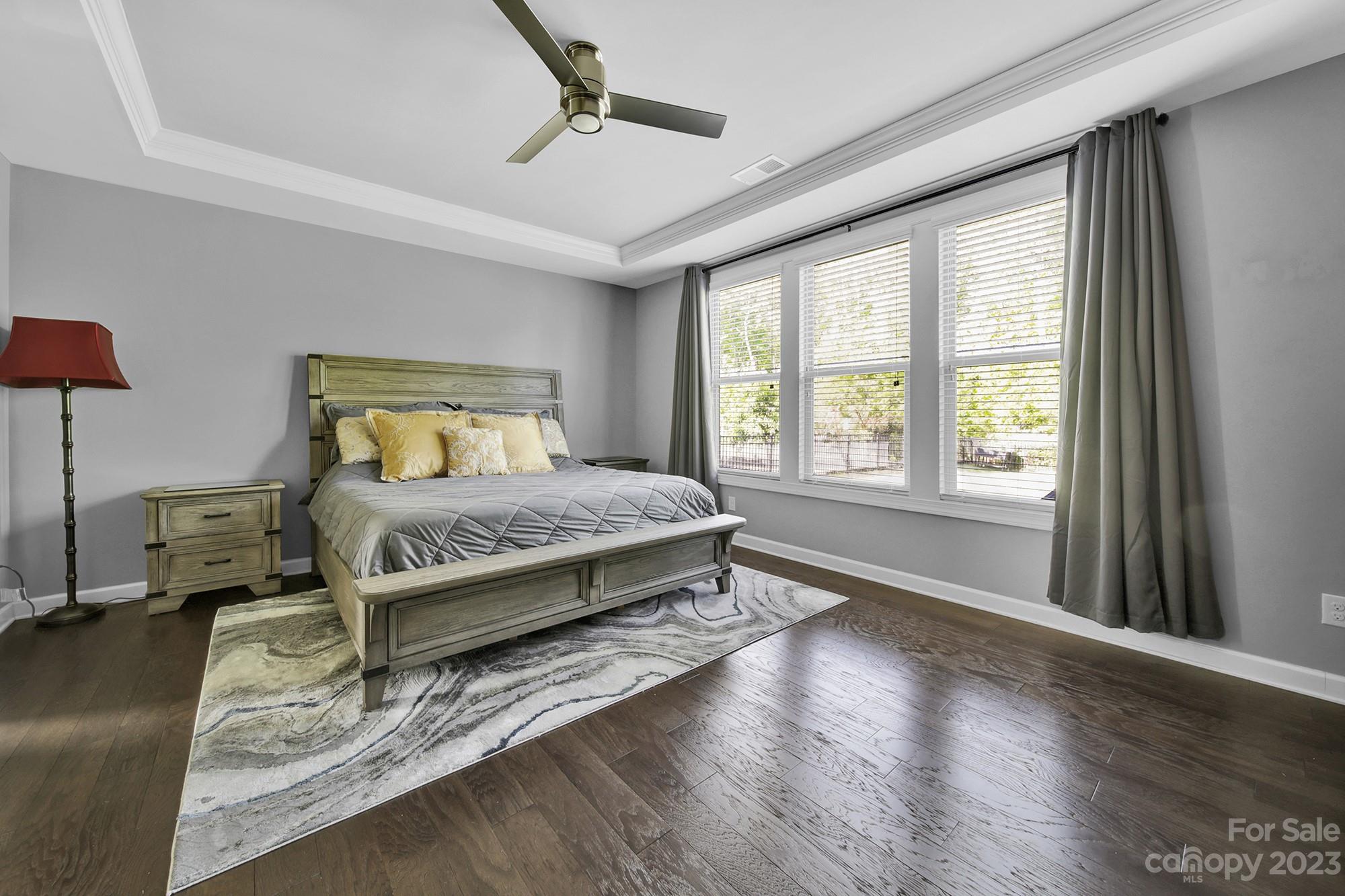1516 Hazel Street Tega Cay, SC 29708 - Photo 27 of 48 a bedroom with a large bed and a window