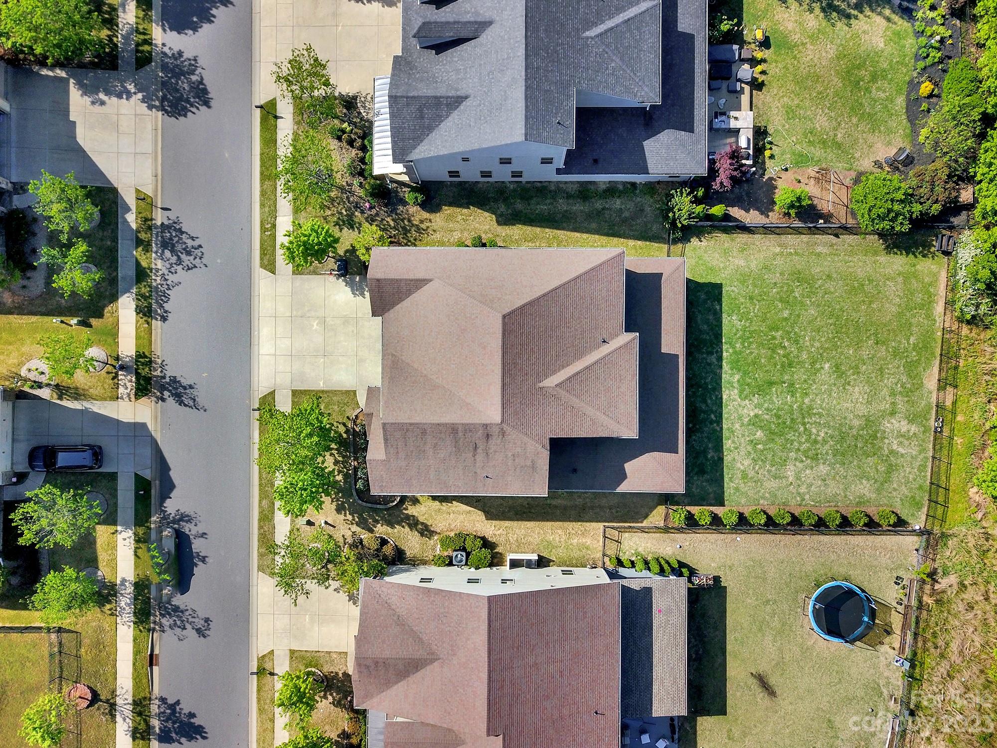 1516 Hazel Street Tega Cay, SC 29708 - Photo 8 of 48 an aerial view of a house with a swimming pool