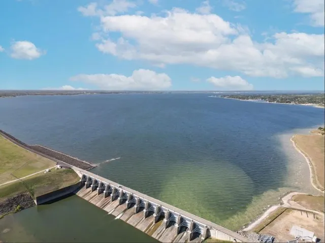 a view of swimming pool from a balcony