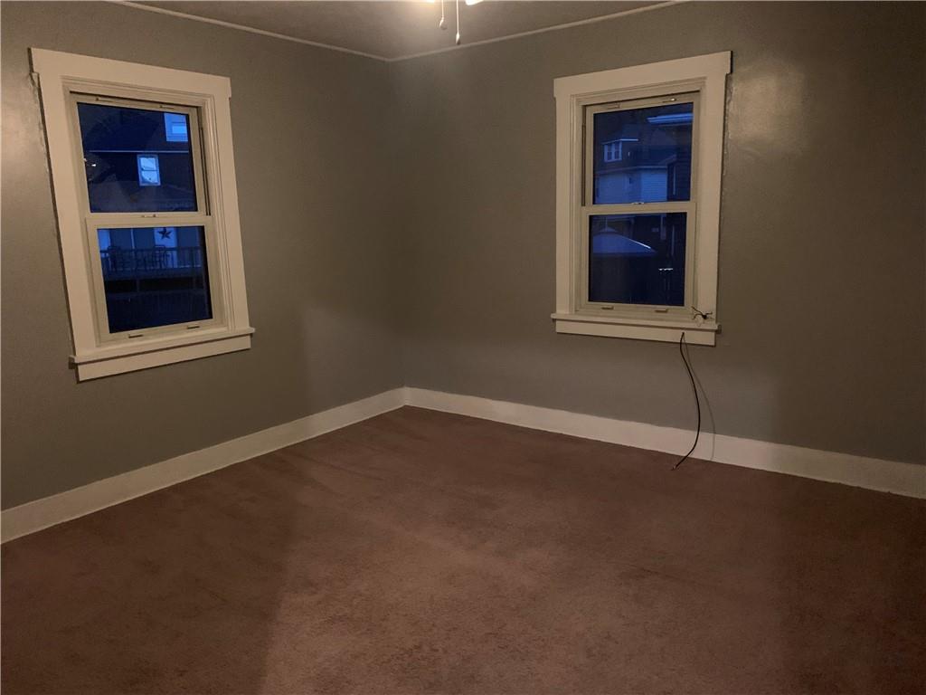 5 Carnegie Drive Midland, PA 15059 - Photo 11 of 18 a room that has a window in it