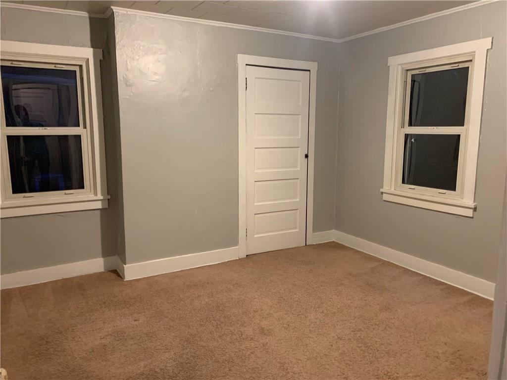 5 Carnegie Drive Midland, PA 15059 - Photo 12 of 18 an empty room with windows