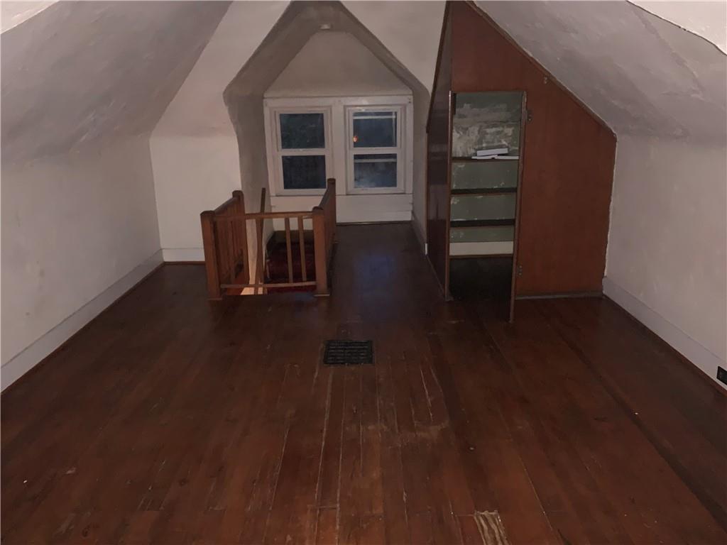 5 Carnegie Drive Midland, PA 15059 - Photo 15 of 18 a view of a livingroom with furniture and hardwood floor