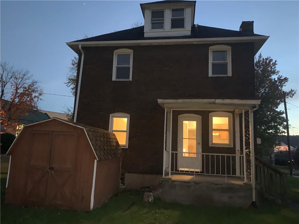 5 Carnegie Drive Midland, PA 15059 - Photo 2 of 18 a front view of a house with glass windows