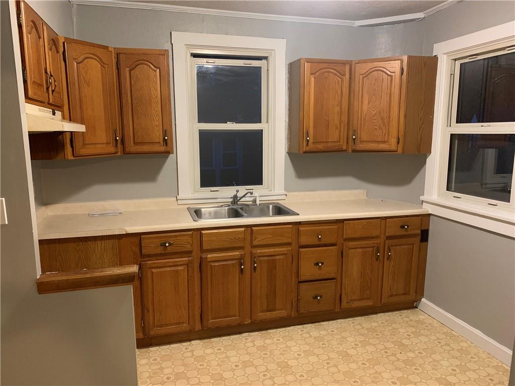 5 Carnegie Drive Midland, PA 15059 - Photo 4 of 18 a spacious bathroom with a sink and a mirror