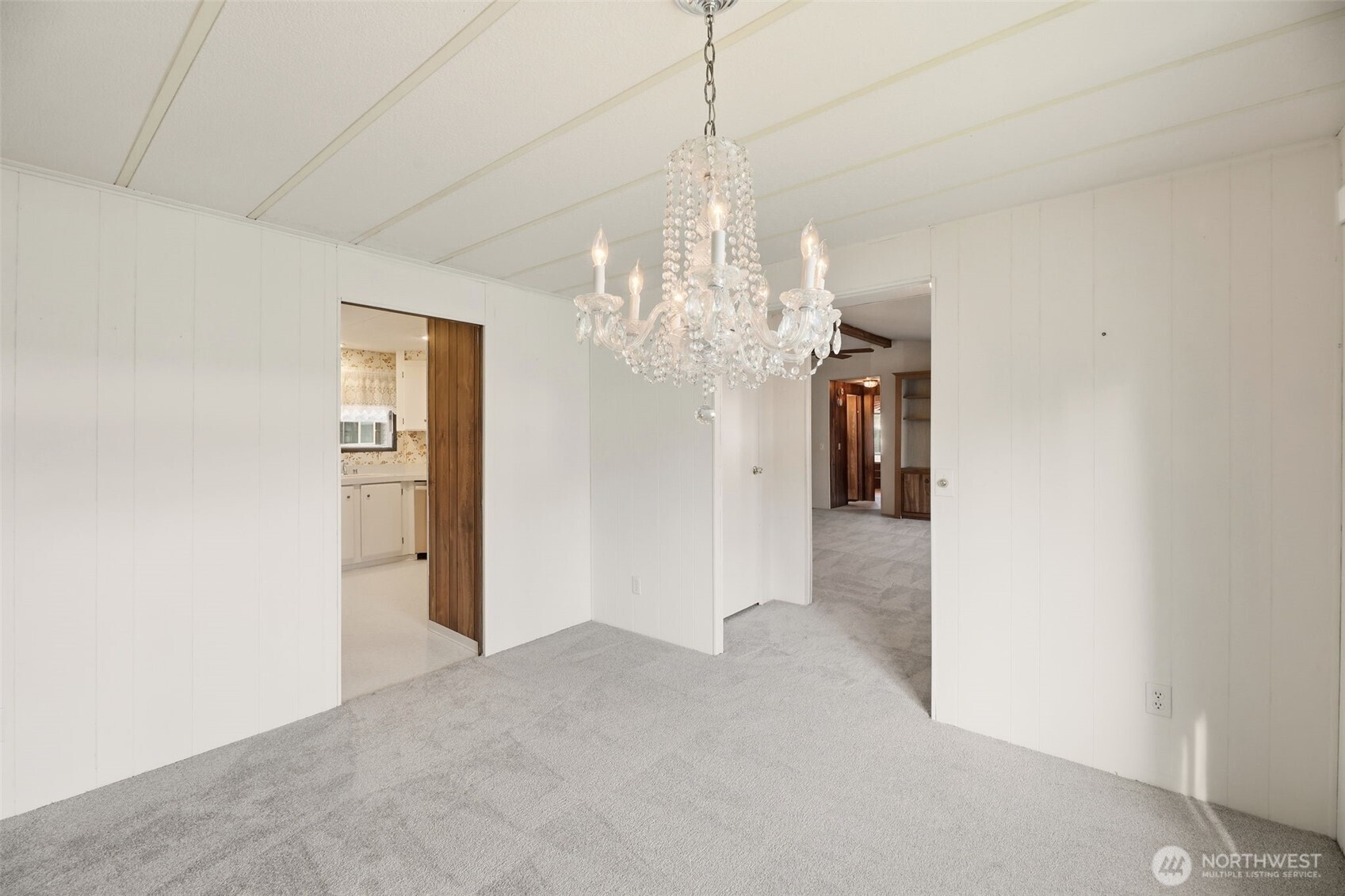 620 112th Street Southeast, Unit 205 Everett, WA 98208 - Photo 14 of 34 a view of a chandelier in big room and chandelier