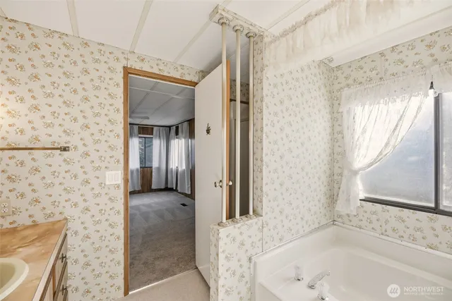 a view of a livingroom with a balcony