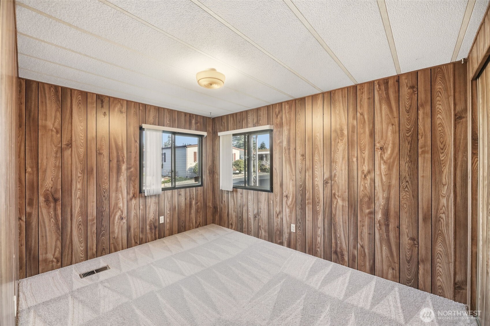620 112th Street Southeast, Unit 205 Everett, WA 98208 - Photo 19 of 34 a view of a livingroom with a balcony