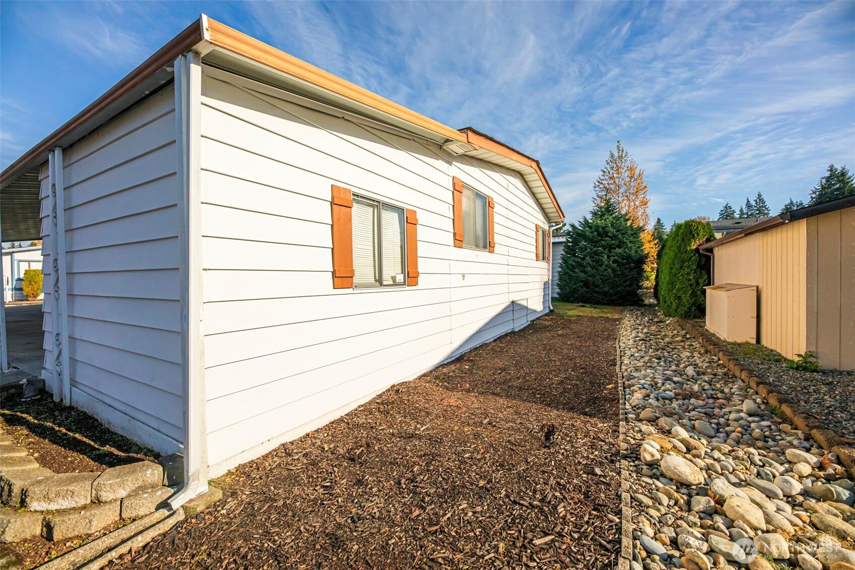 620 112th Street Southeast, Unit 205 Everett, WA 98208 - Photo 28 of 34 a view of a house with a backyard