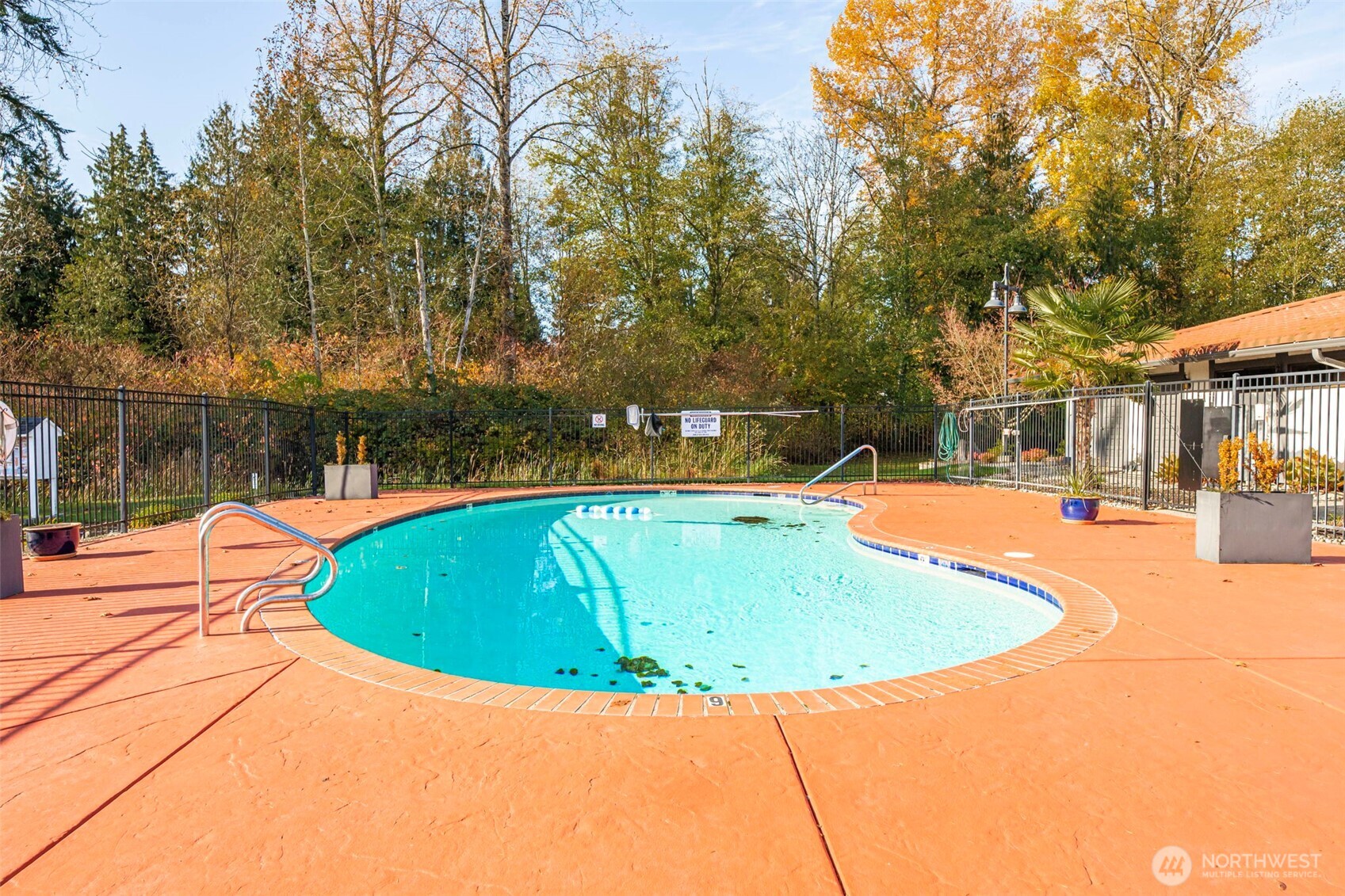 620 112th Street Southeast, Unit 205 Everett, WA 98208 - Photo 32 of 34 a view of a swimming pool with a patio