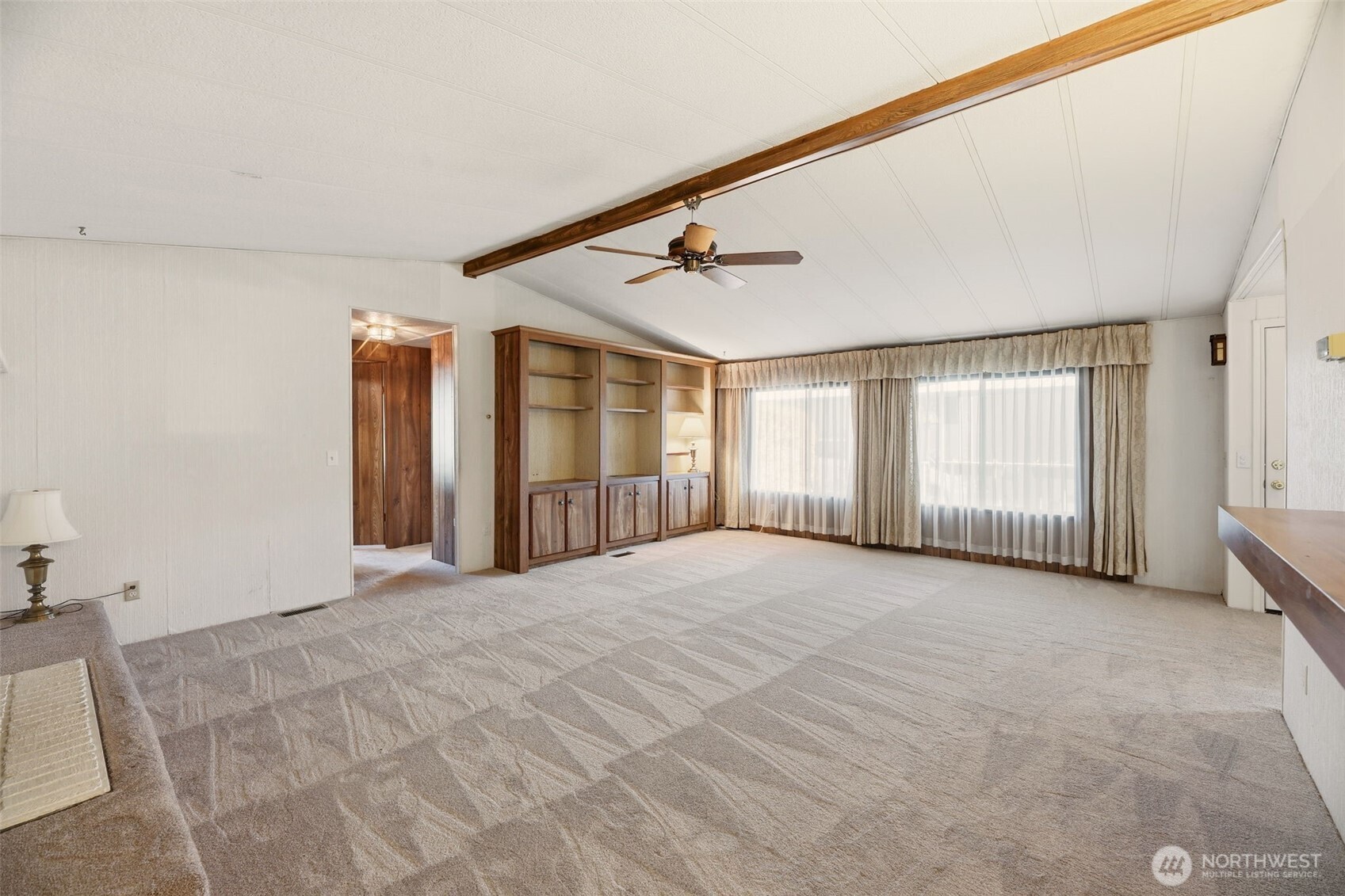 620 112th Street Southeast, Unit 205 Everett, WA 98208 - Photo 8 of 34 a view of an empty room with windows