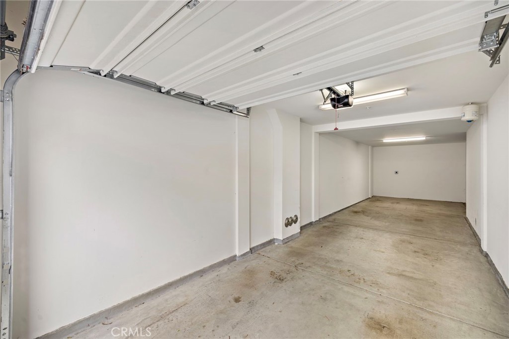 111 Bowery Irvine, CA 92612 - Photo 11 of 20 Large 2 Car tandem garage with extra storage and EV Charging outlet