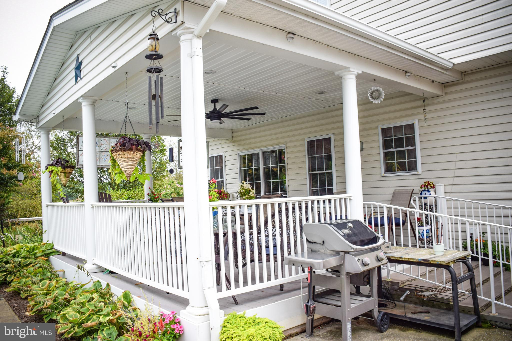 765 Gun Club Road Stephenson, VA 22656 - Photo 113 of 113 a view of a chair and table in the balcony